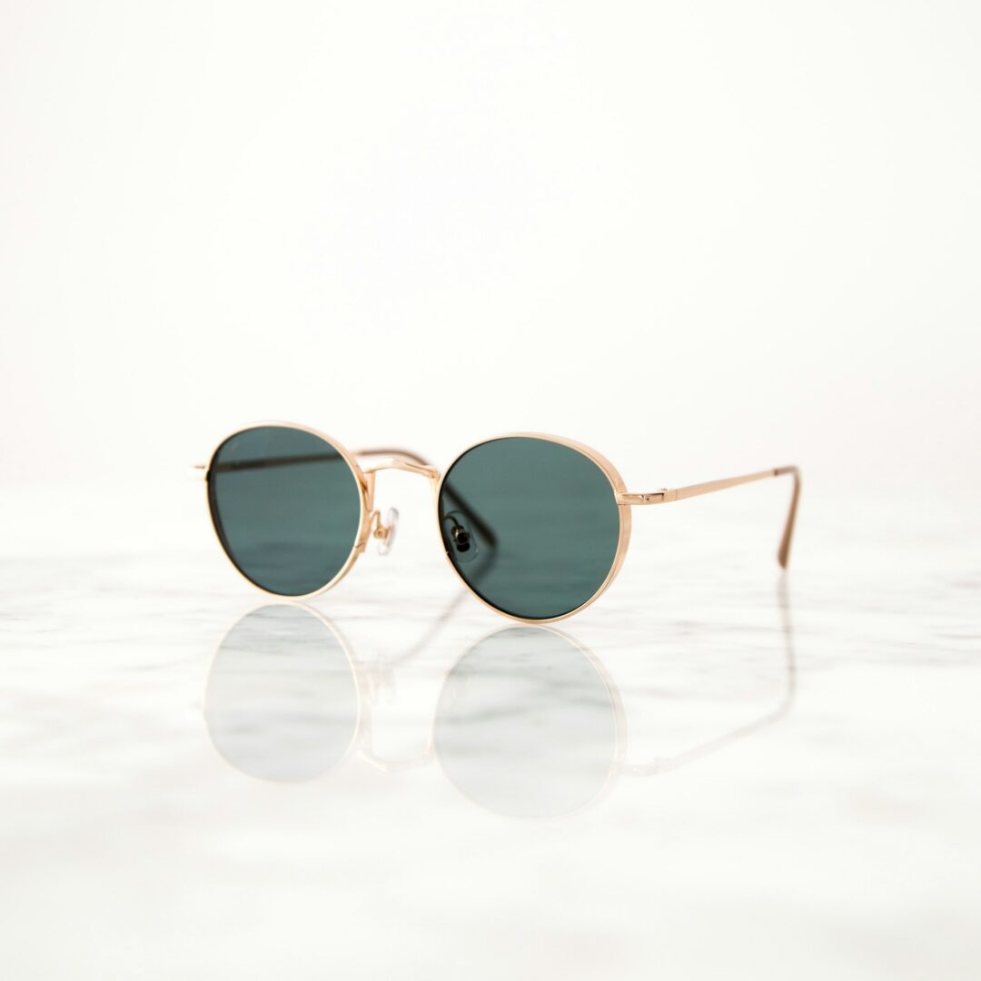 Sunglasses on sand